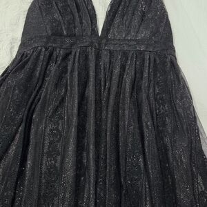 Elegant Black Gown With Crossed Back